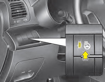 With the ignition switch in the ON position, pressing the heated steering wheel