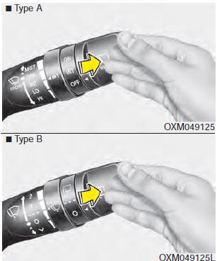 Push the lever away from you to spray rear washer fluid and to run the rear wipers