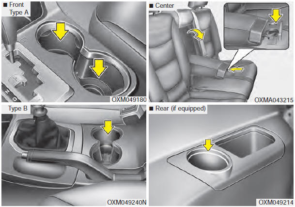 Cups or small beverage cans may be placed in the cup holders.