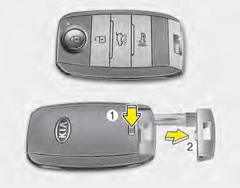 To remove the mechanical key, press and hold the release button(1) and remove